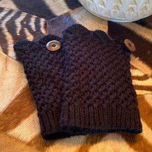 Black knitted boot toppers.